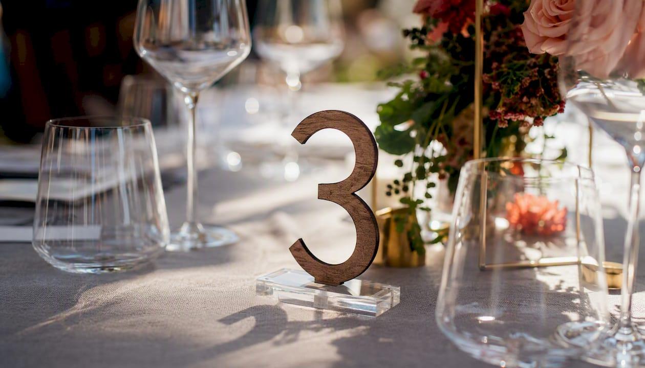 Flat wooden number on acrylic base modern table