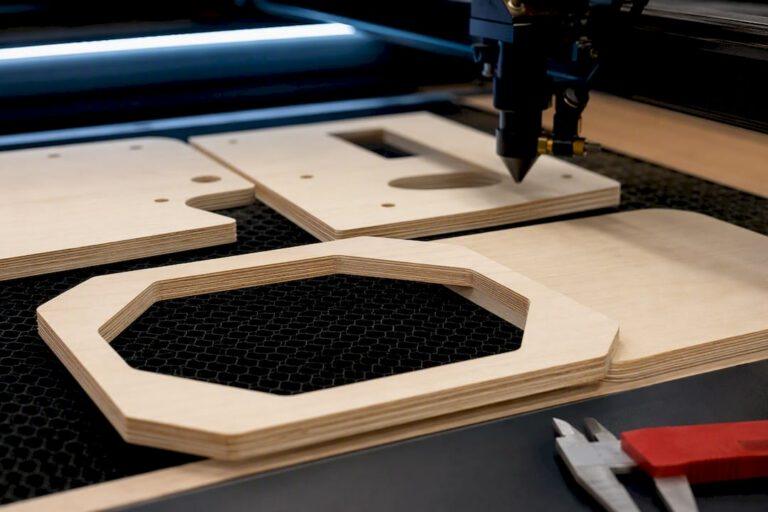 Baltic birch blanks beneath laser cutter