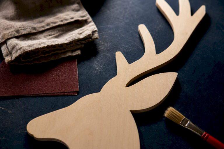 Close detail of unfinished plywood deer cutout