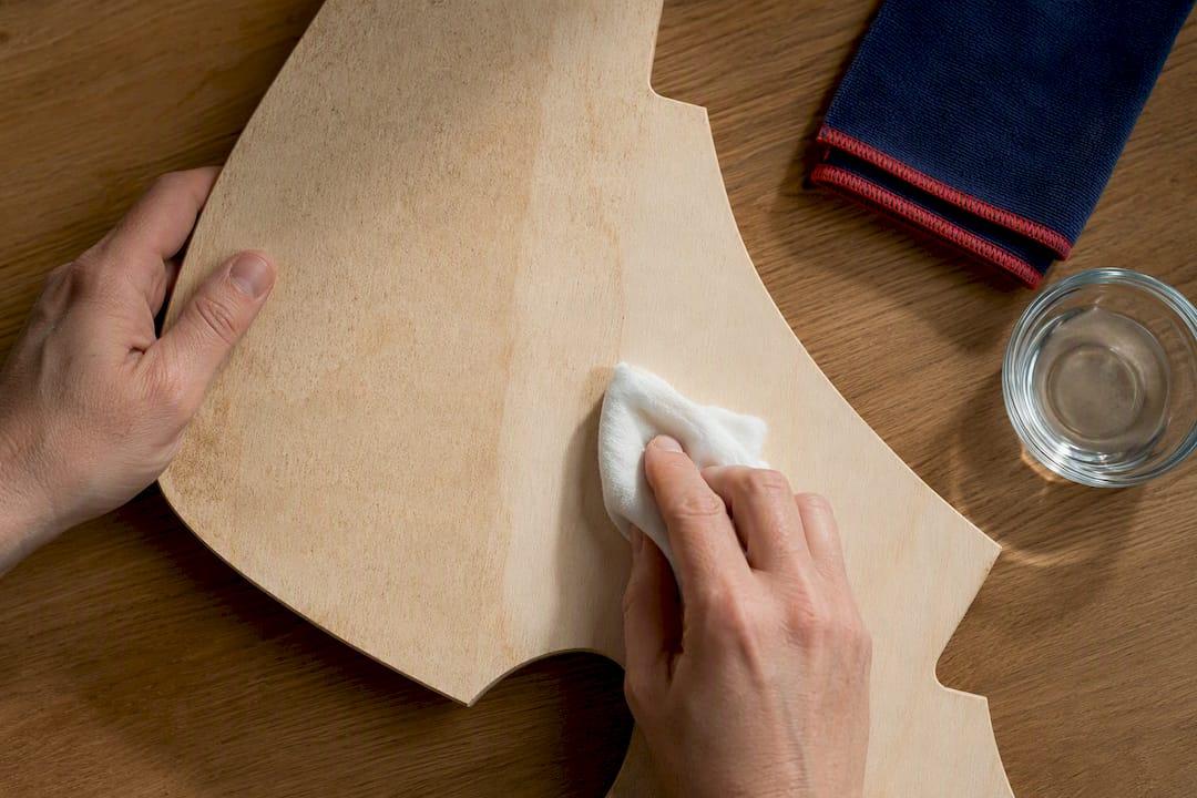 Cleaning dust from an unfinished wood surface