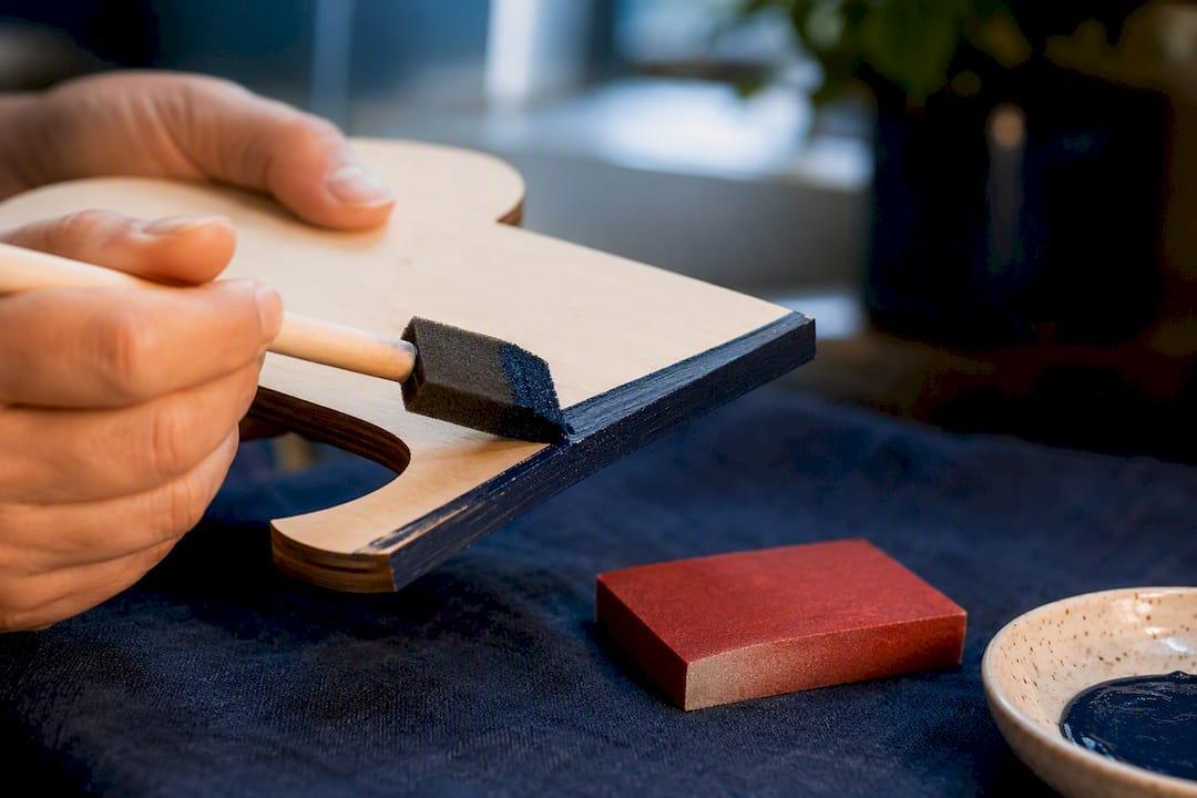 Painting an unfinished wood cutout edge