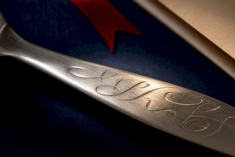 Close-up of engraved handle lettering