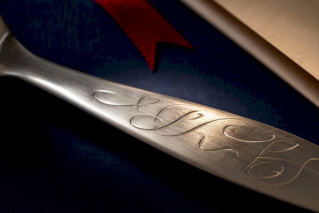 Close-up of engraved handle lettering