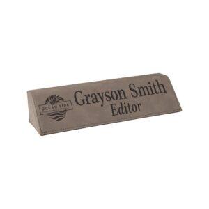 Personalized faux leather desk name plate in gray, laser engraved