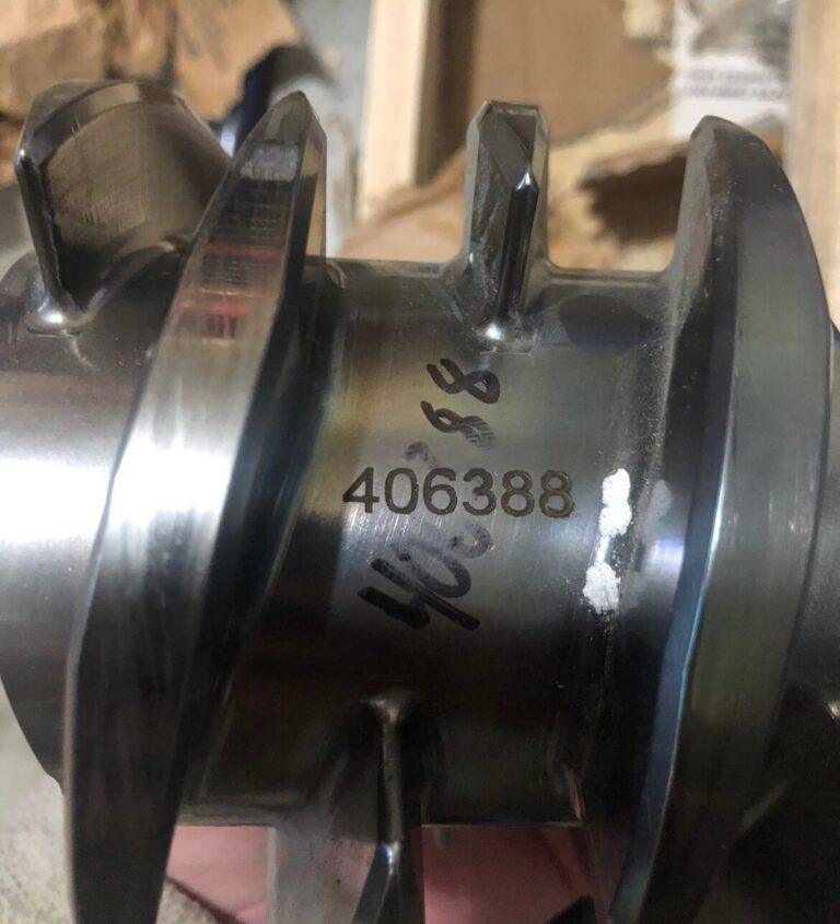 Part number laser marked on a machined metal part